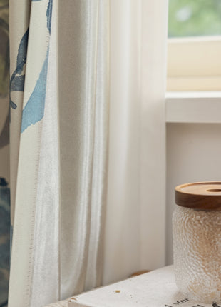 a window sill with a jar on top of it