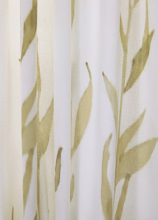 a close up of a curtain with leaves on it
