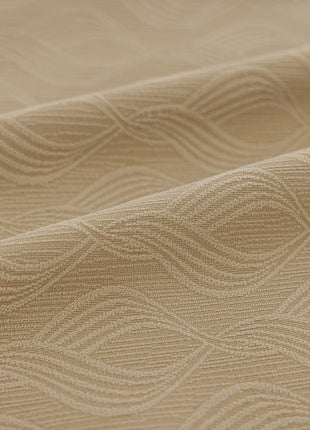 a close up of a beige fabric with wavy lines