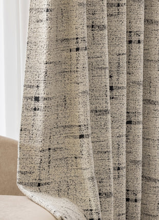 a close up of a curtain in a living room