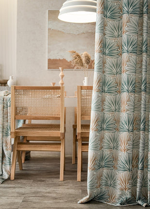 a dining room with a table and chairs