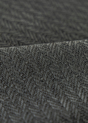 a close up of a black and white blanket