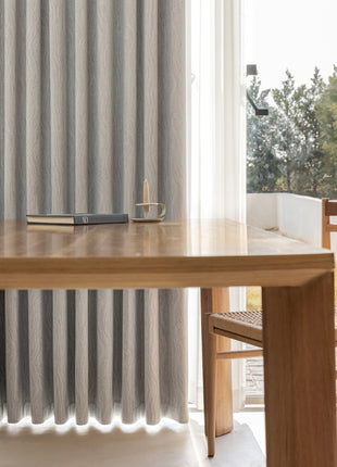 a wooden table with a book on top of it