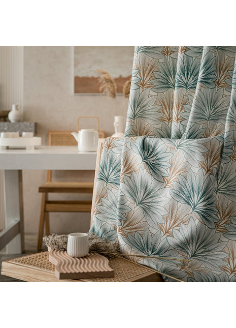 a living room with a chair and a table