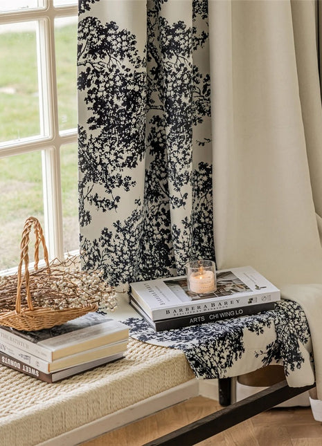 a table with books and a basket on top of it
