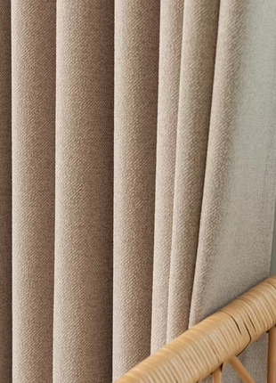 a close up of a window with a curtain