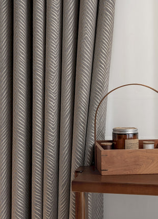 a wooden basket sitting on top of a wooden table