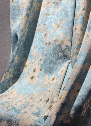 a close up of a chair with a flower pattern on it