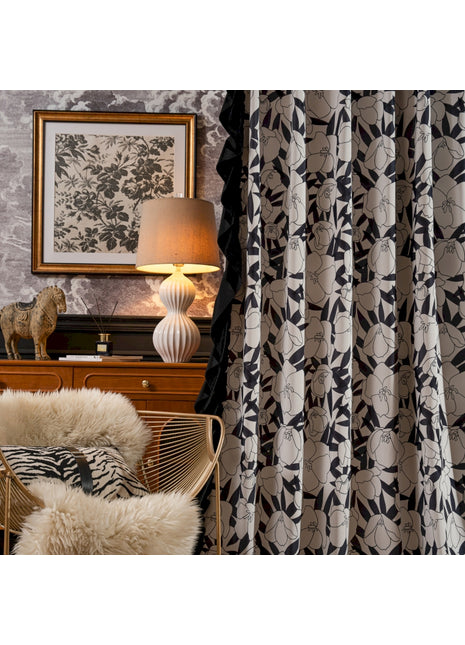 a chair and a lamp in a room