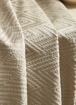 a close up of a blanket on a table