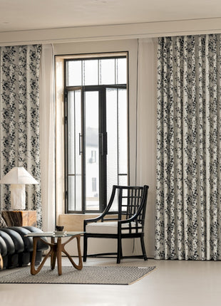 a living room filled with furniture and a large window