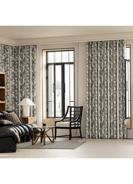 a living room filled with furniture and a large window