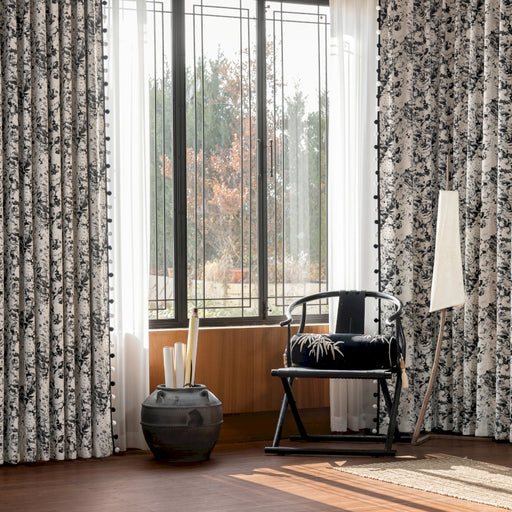 a living room with a chair and a large window