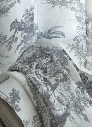 a close up of a chair with a curtain