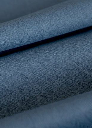 a close up of a blue leather material