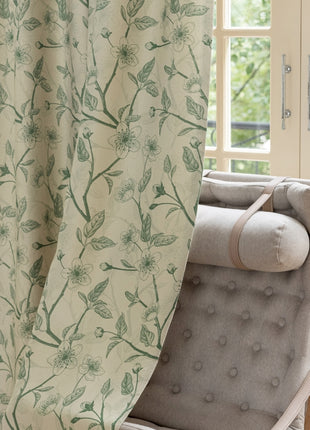 a chair sitting in front of a window