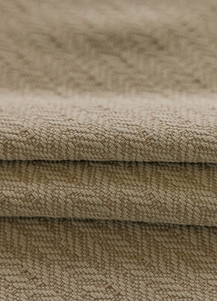 a close up of a blanket folded on top of each other