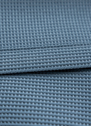 a close up view of a blue fabric