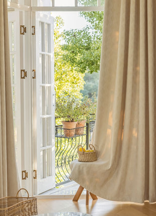 a living room with a large open window