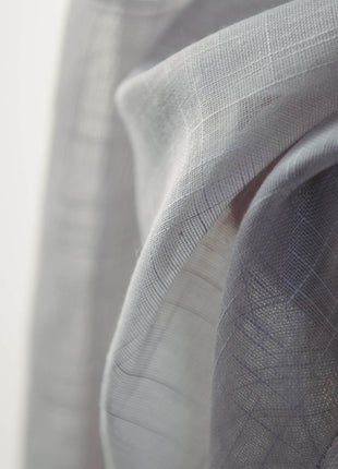 a close up of a gray scarf on a white background