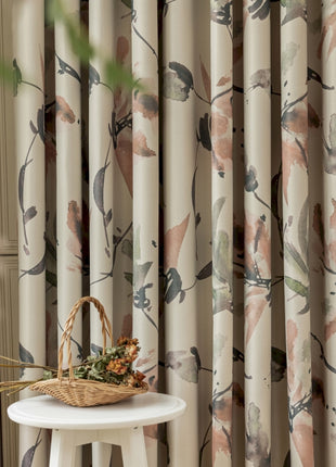 a basket sitting on top of a table next to a window