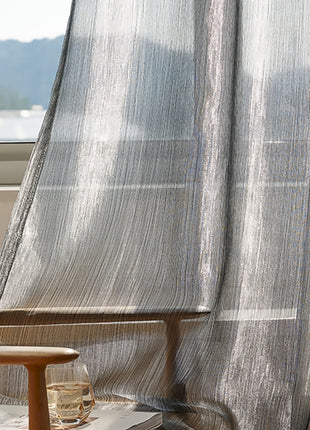 a wooden chair sitting next to a window