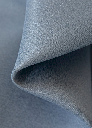 a close up view of a blue fabric
