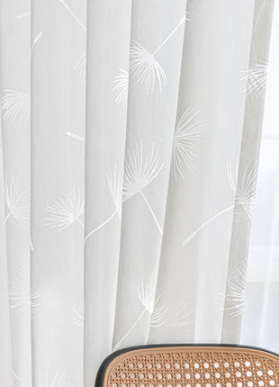 a brown suitcase sitting on top of a wooden table