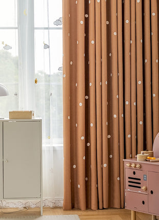 a child's room with a white cabinet and pink dresser
