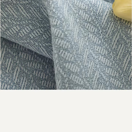 a close up of a blue and white fabric