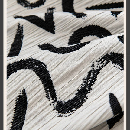 a close up of a black and white fabric