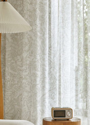 a room with a lamp and a radio on a table