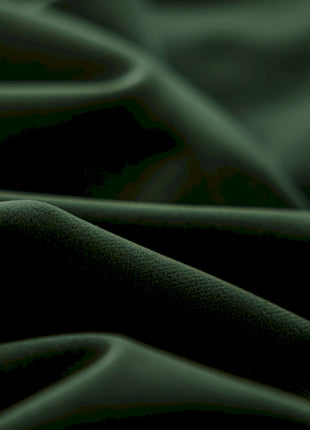 a close up of a black and green fabric