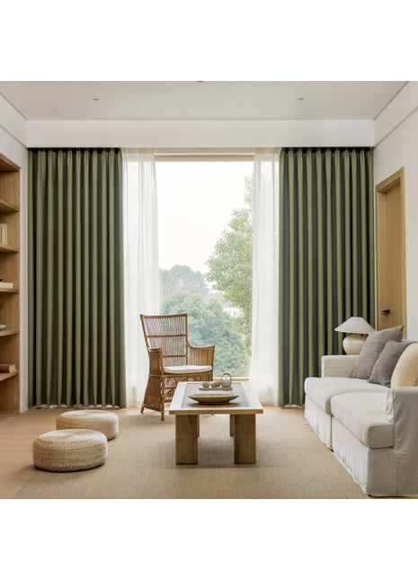 a living room filled with furniture and a large window