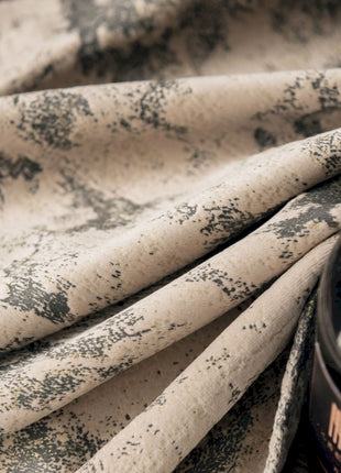 a can of soda sitting on top of a table