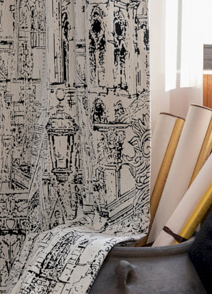 a close up of a vase with a curtain in the background