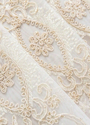Voilage oriental brodé crème vintage