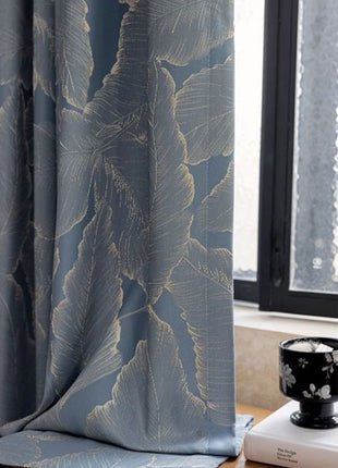 Rideau bleu motif bois doré salon