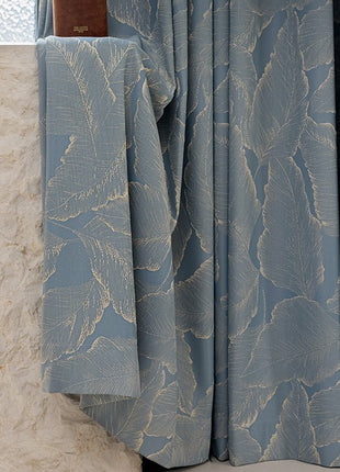 Rideau bleu motif bois doré salon
