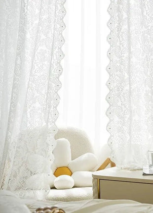 Voilage blanc brodé arabesques style bohème chic